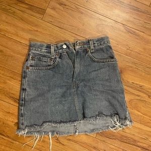 Levi jeans skirt. There are 3 stain spots in the back